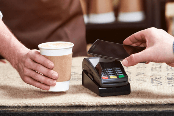 A man paying online through phone I LegalTechMunch